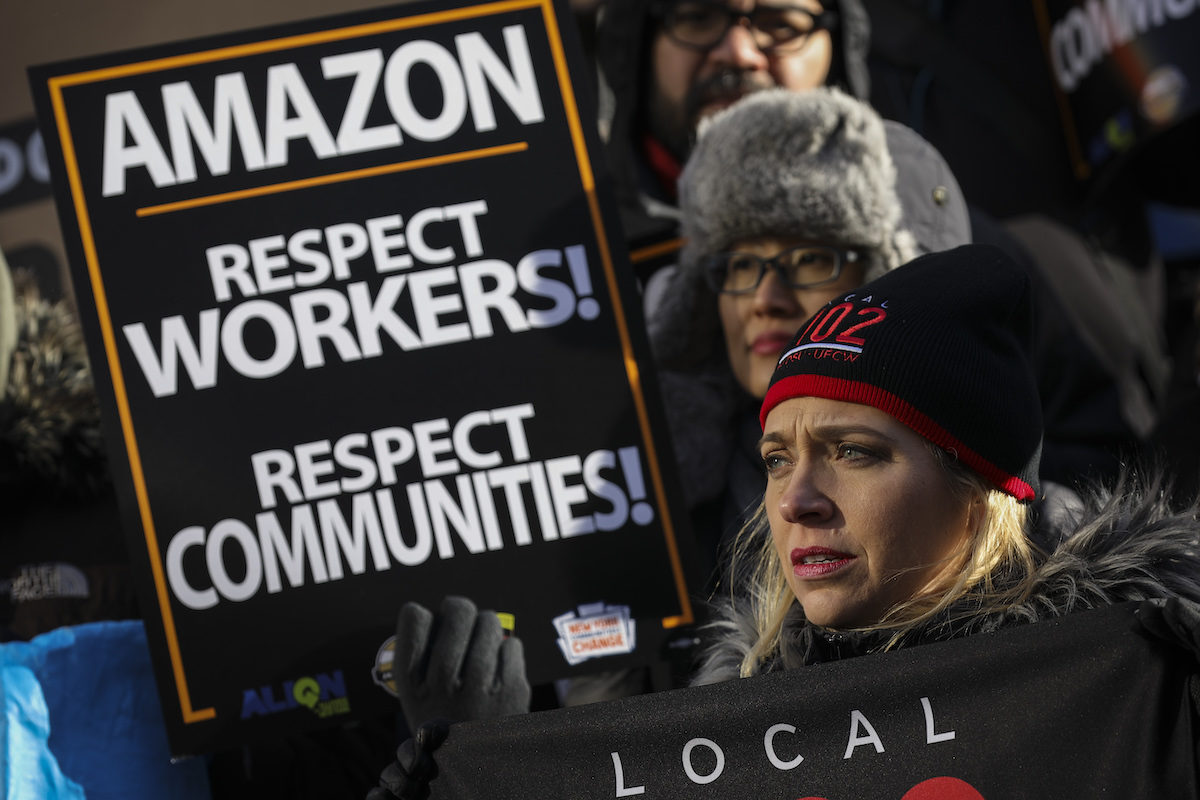 NEW YORK, NY - JANUARY 30: Protestors rally against Amazon and the company's plans to move their second headquarters to the Long Island City neighborhood of Queens, at New York City Hall, January 30, 2019 in New York City. Some Queens community members and activists say Amazon's move to Queens will further gentrify neighborhoods in the area and add more stress to an already struggling infrastructure system. (Photo by Drew Angerer/Getty Images)